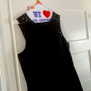 Beautiful bless dress zips up the back sleeveless side pockets. Size 10